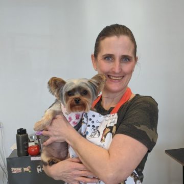 groomer with dog